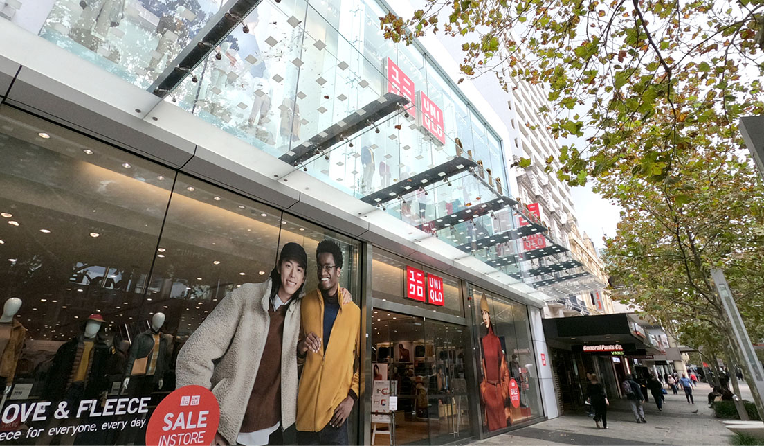 Brisbane Queensland Australia  19th November 2019  View of an Uniqlo  Logo hanging on a glass wall at the shop entrance in Queenstreet Mall in  Bris Stock Photo  Alamy